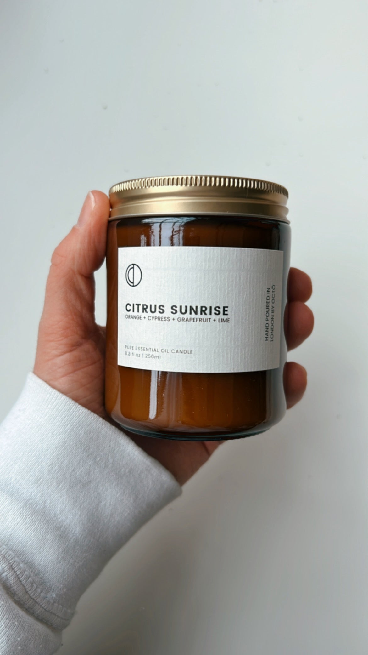 One-off blend essential oil candle in amber glass jar by OCTŌ