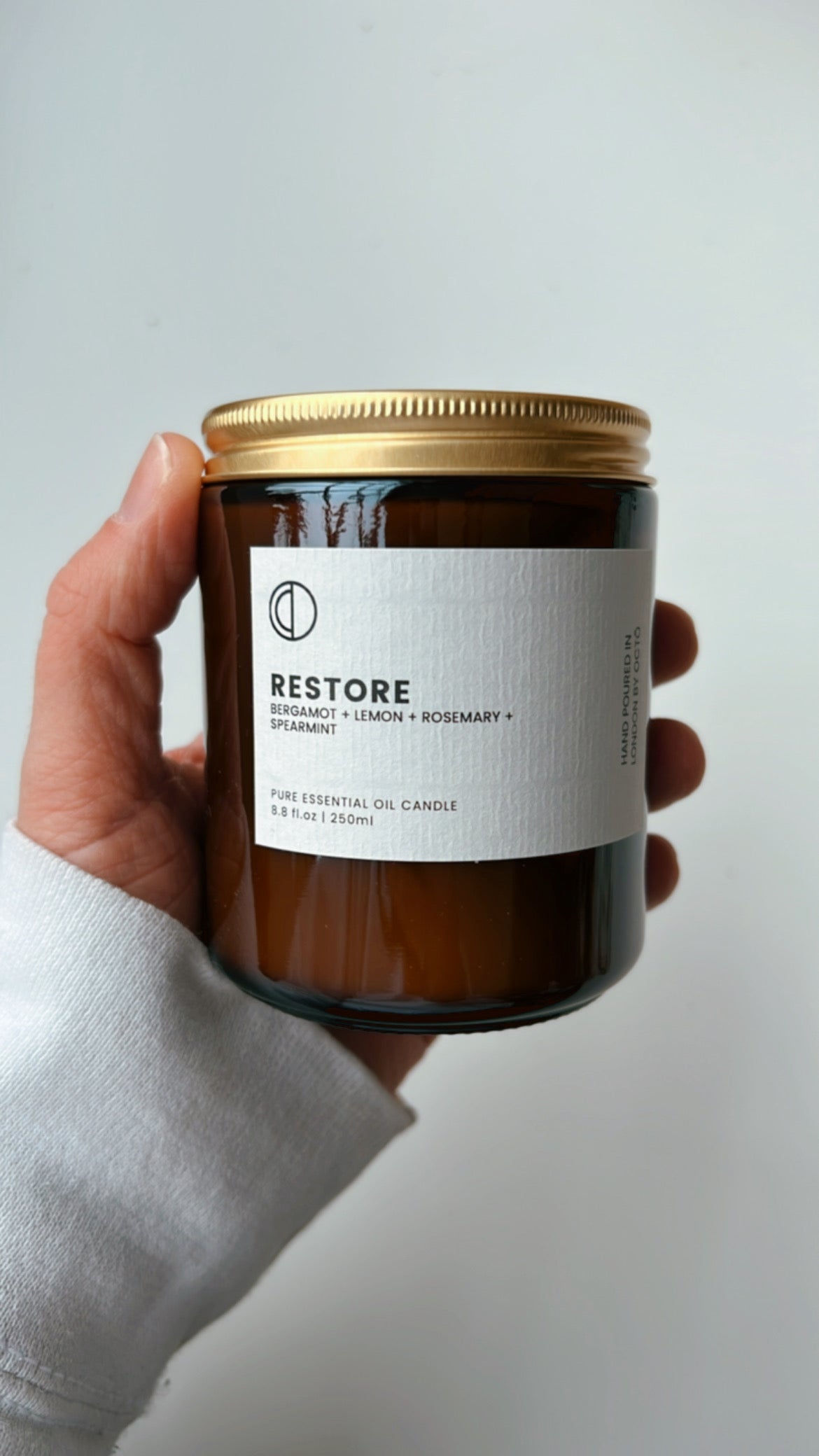 One-off blend essential oil candle in amber glass jar by OCTŌ