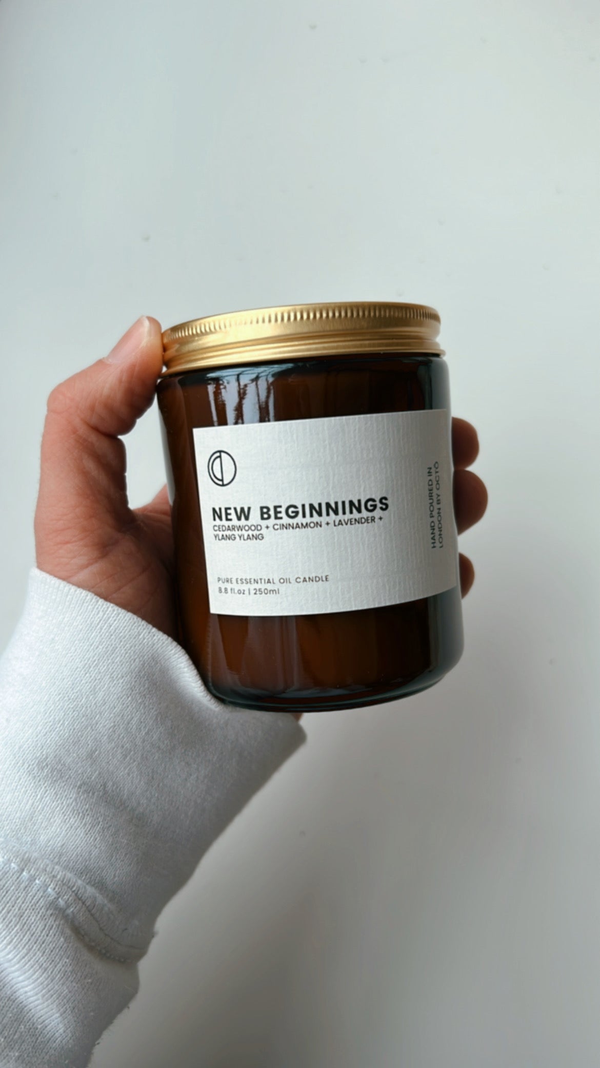 One-off blend essential oil candle in amber glass jar by OCTŌ