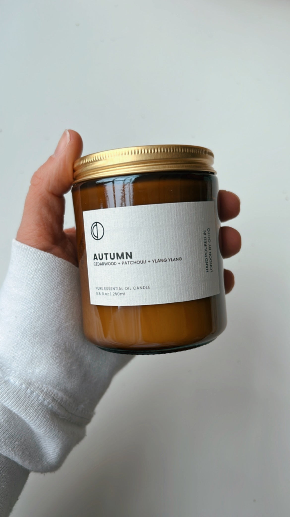 One-off blend essential oil candle in amber glass jar by OCTŌ