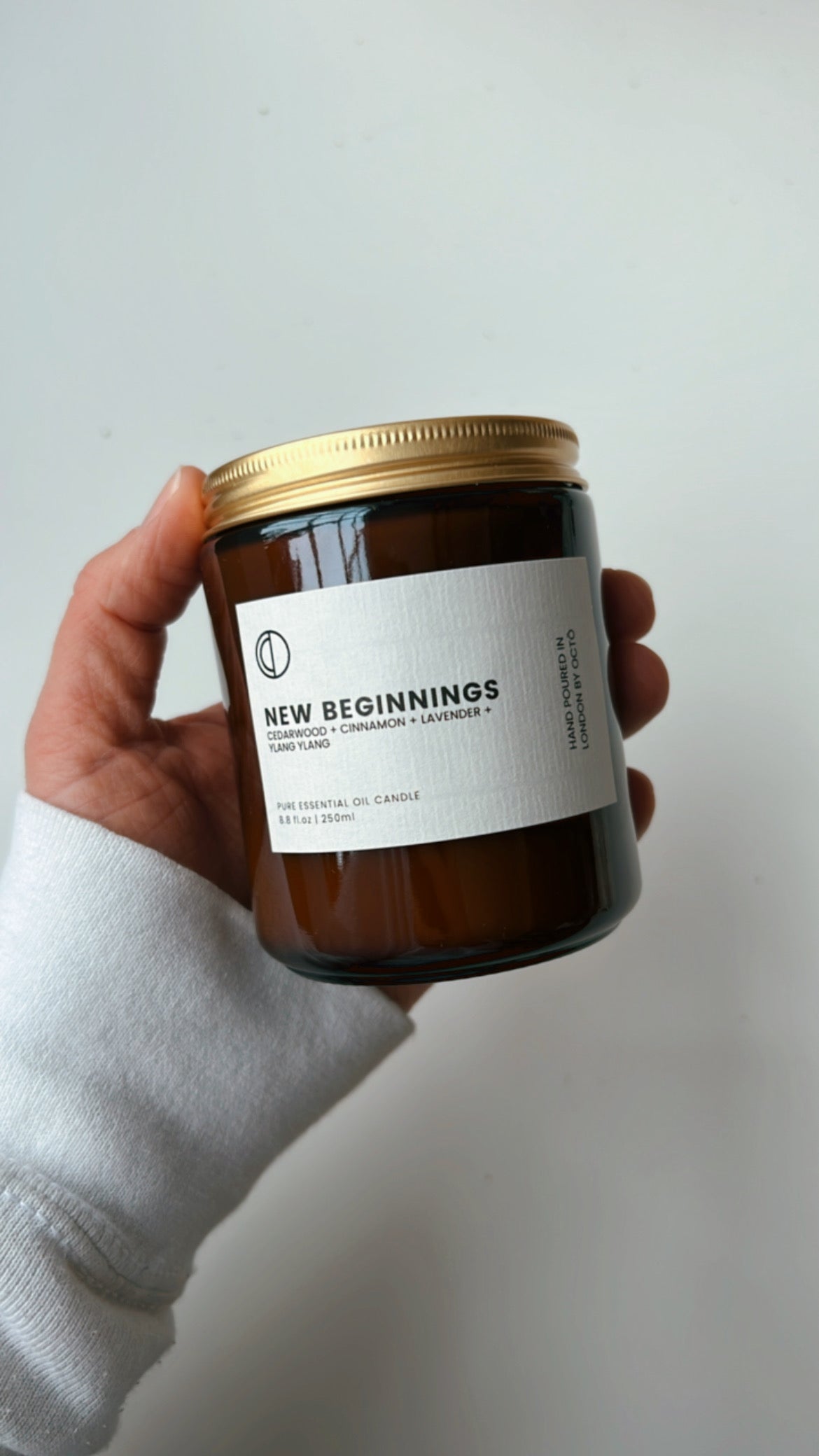 One-off blend essential oil candle in amber glass jar by OCTŌ
