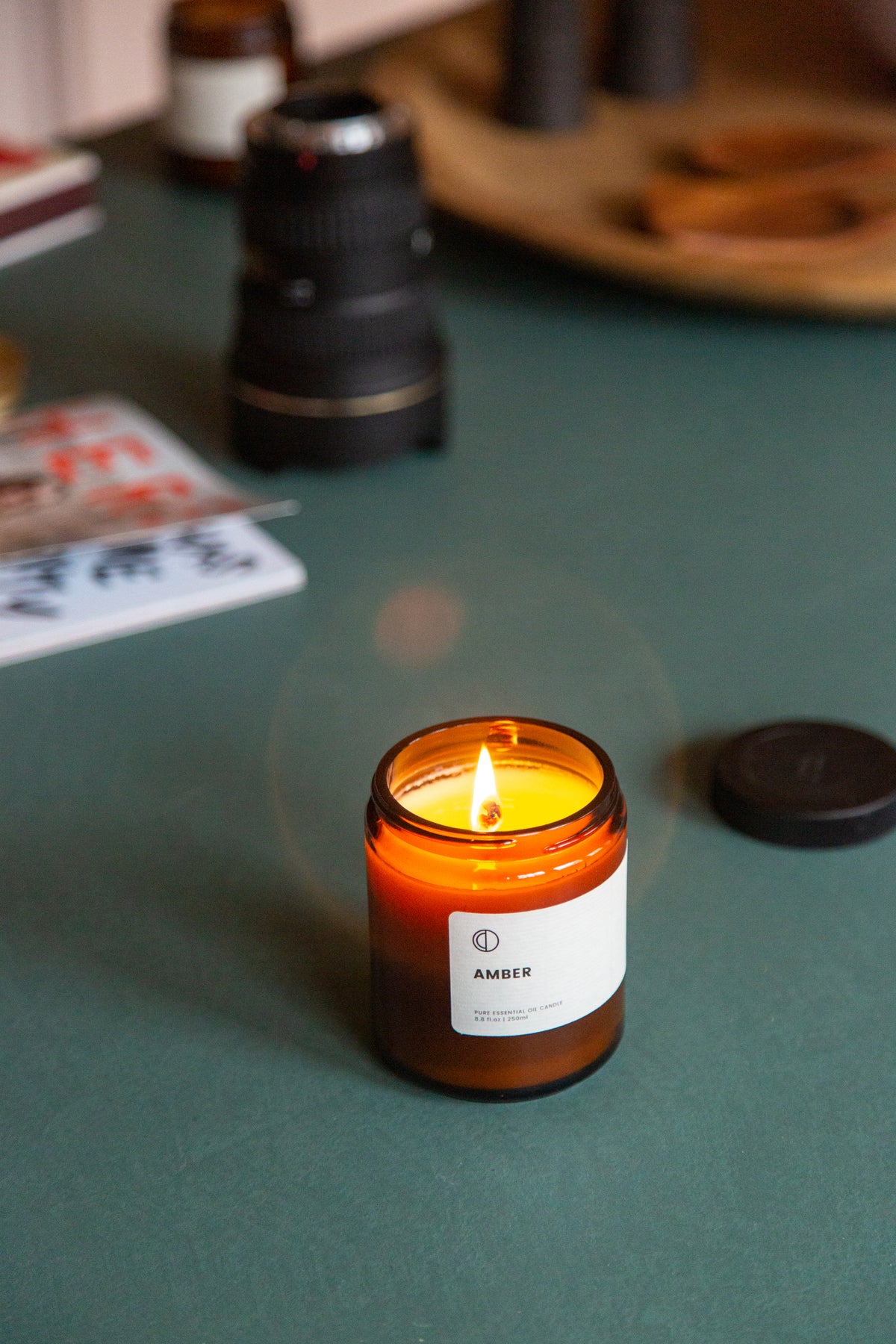 Amber essential oil candle in amber glass jar by OCTŌ