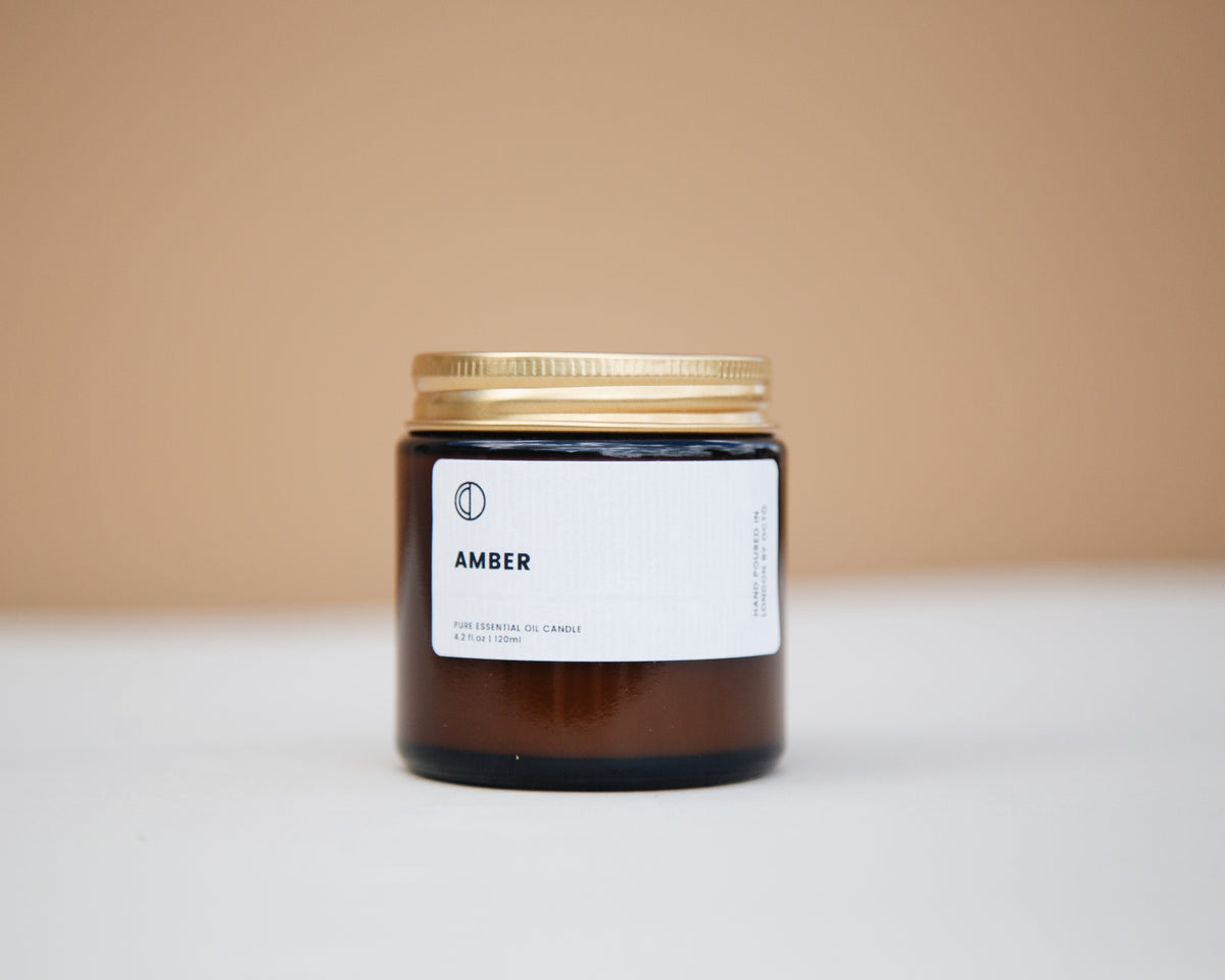 Amber essential oil candle in amber glass jar by OCTŌ