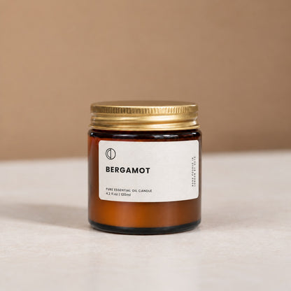 Bergamot essential oil candle in amber glass jar by OCTŌ