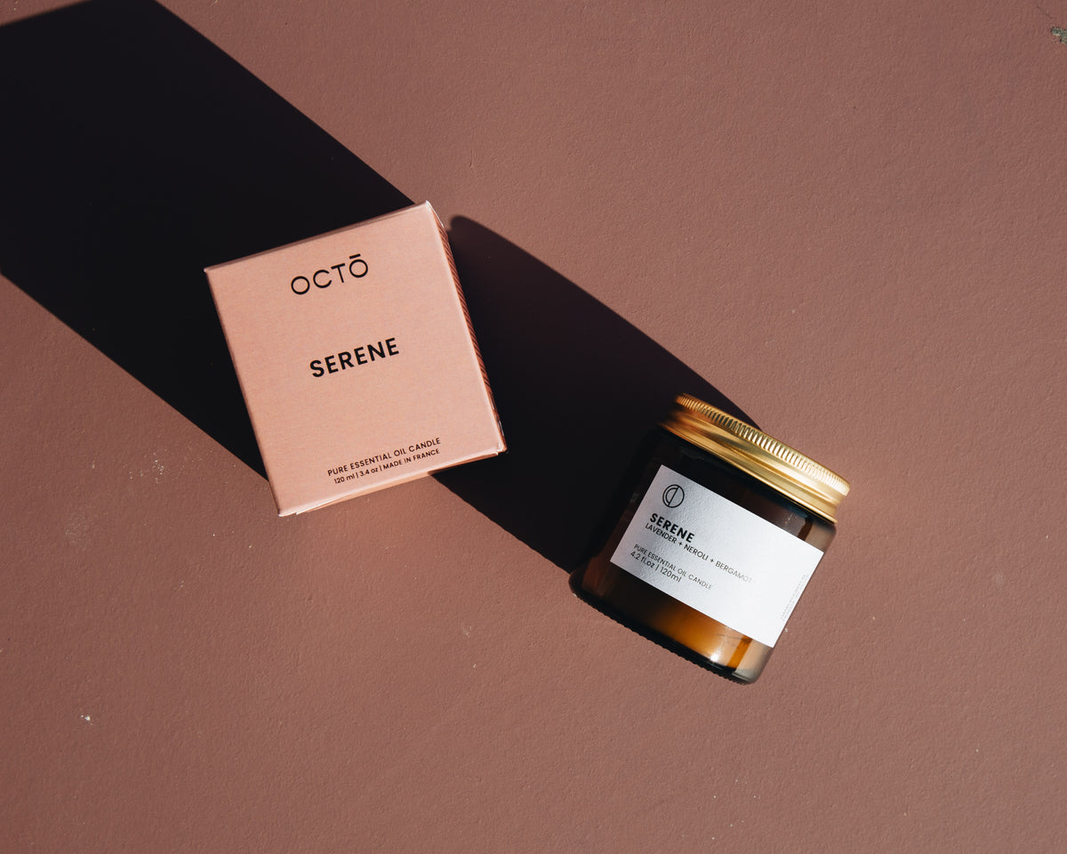Serene essential oil candle in amber glass jar by OCTŌ