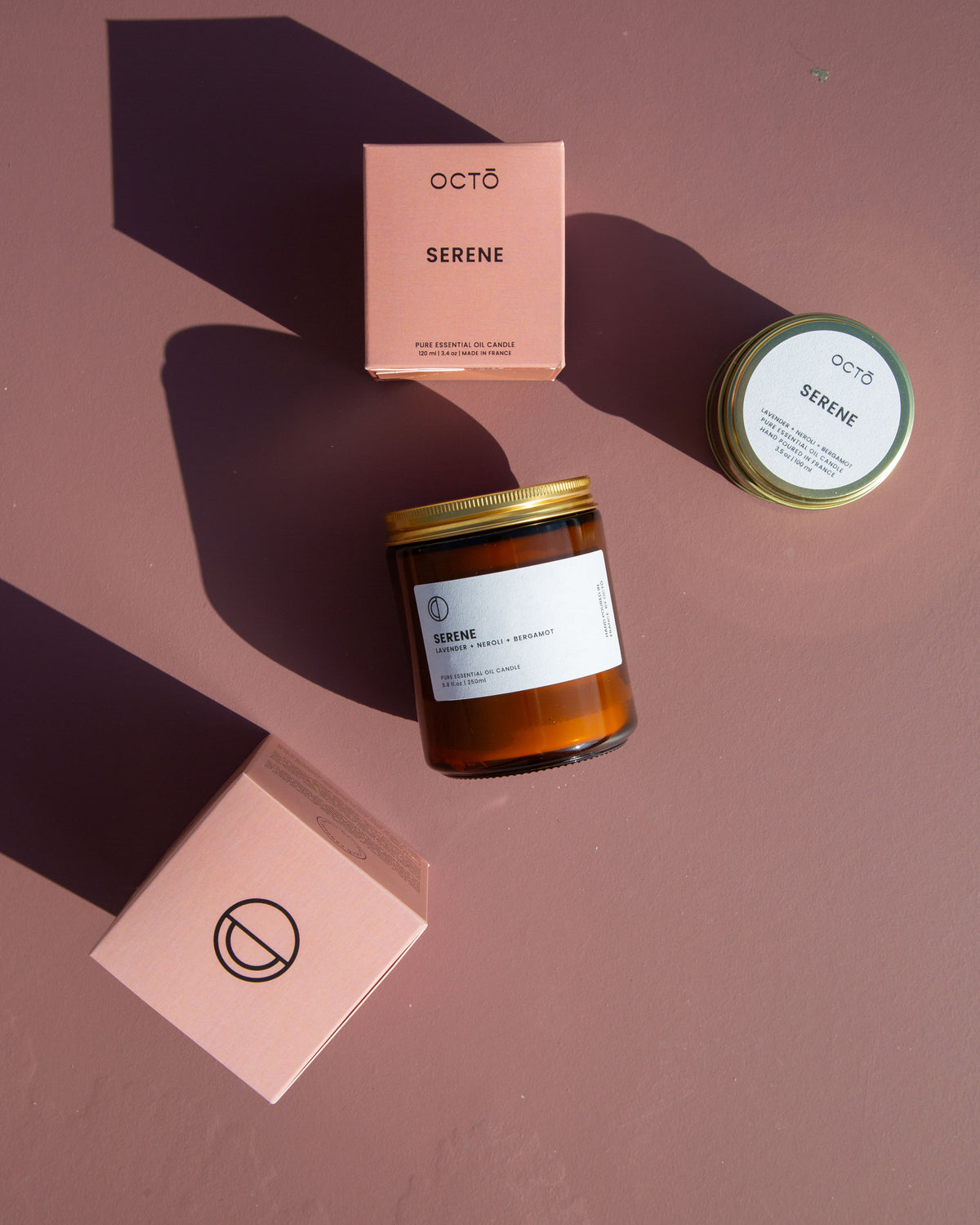 Serene essential oil candle in amber glass jar by OCTŌ