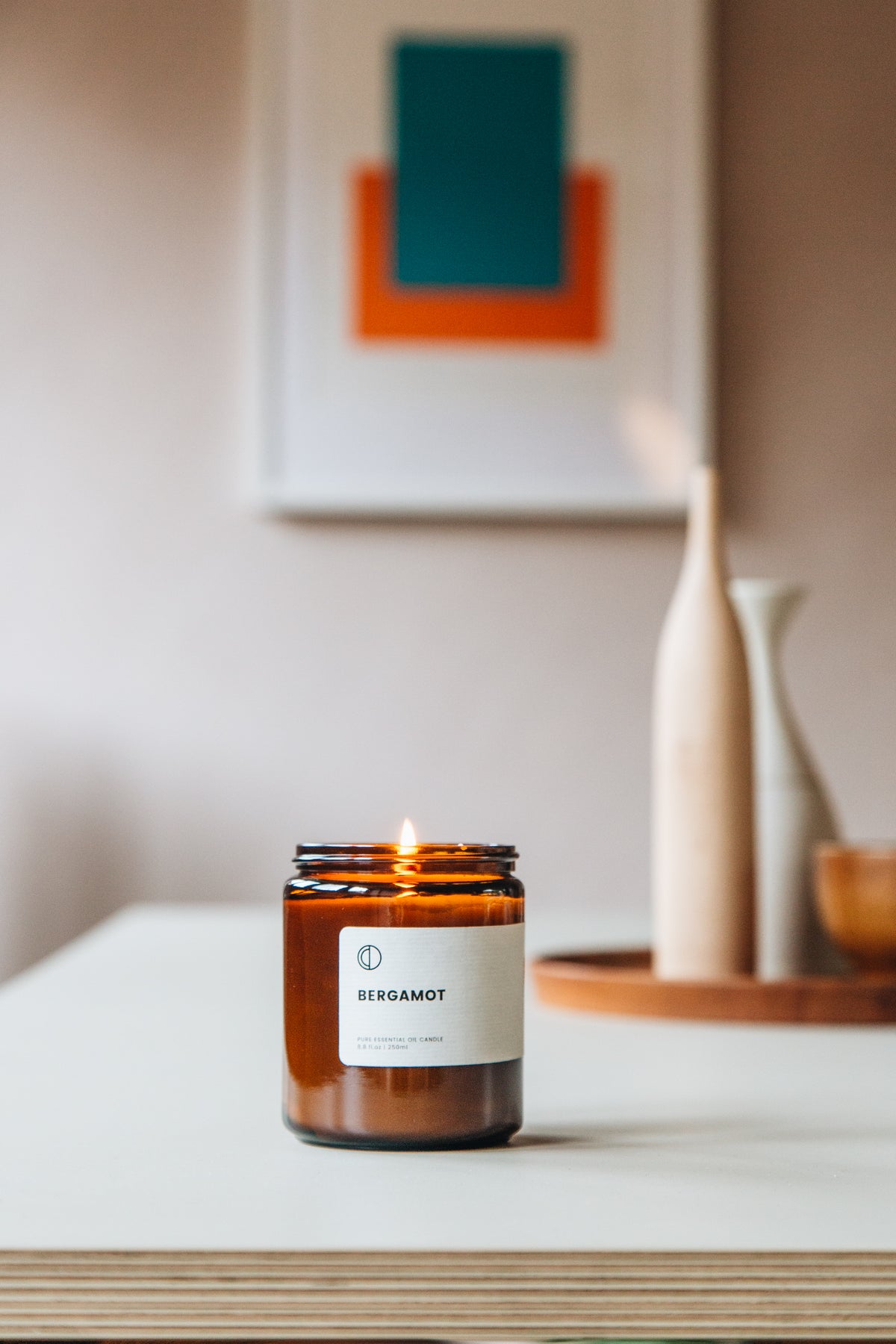 Bergamot essential oil candle in amber glass jar by OCTŌ
