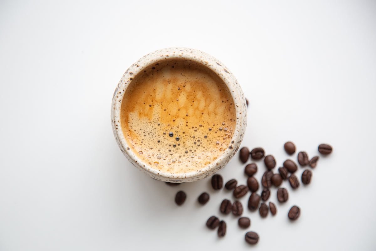 Handmade stoneware coffee cup by OCTŌ x Heath &amp; Sea