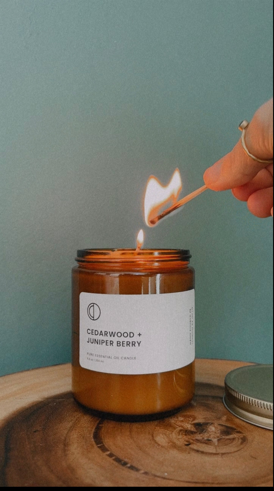 Cedar and Juniper essential oil candle in amber glass jar by OCTŌ
