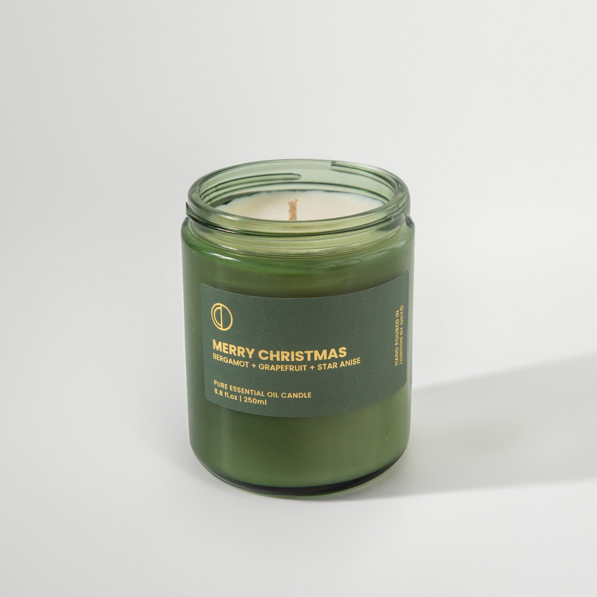 Joyeux Noël (Bergamote + Cannelle + Pamplemousse + Orange amère + Anis étoilé) | Bougie en pot vert