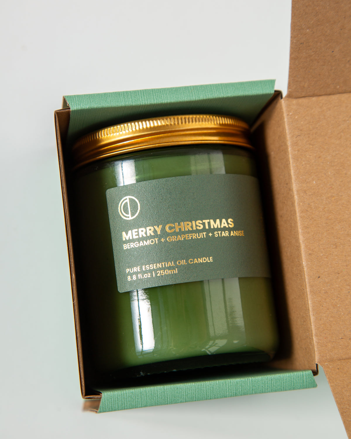 Joyeux Noël (Bergamote + Cannelle + Pamplemousse + Orange amère + Anis étoilé) | Bougie en pot vert