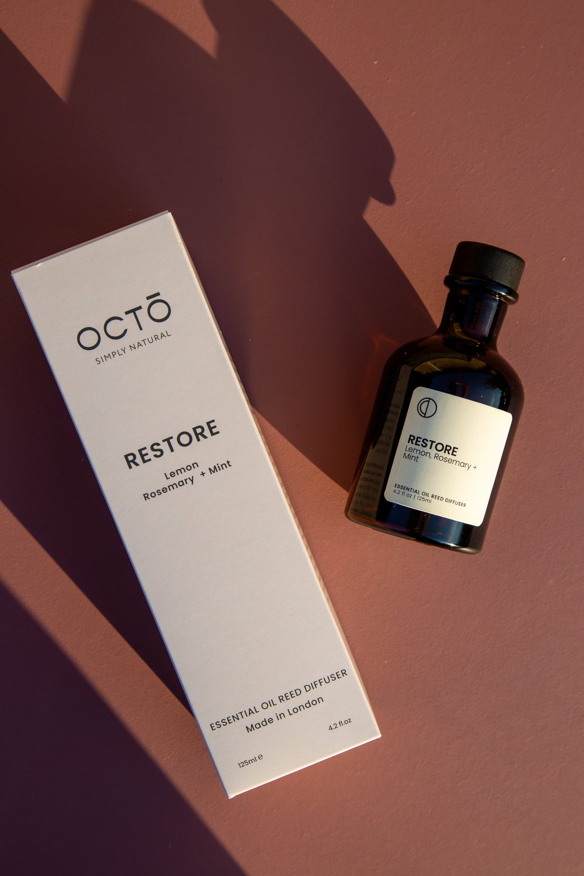 Restore essential oil reed diffuser in amber bottle by OCTŌ