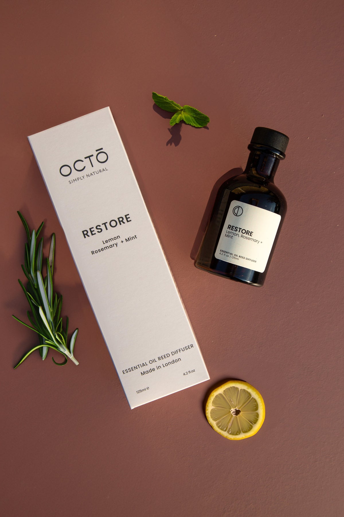 Restore essential oil reed diffuser in amber bottle by OCTŌ