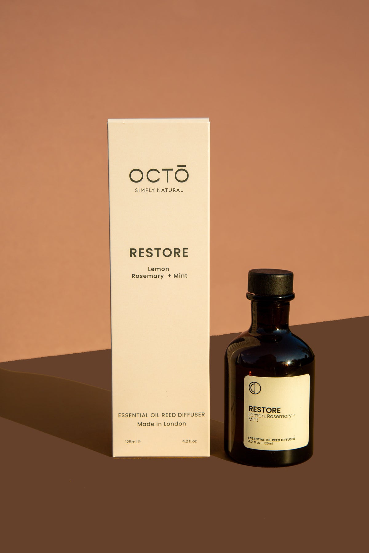 Restore essential oil reed diffuser in amber bottle by OCTŌ