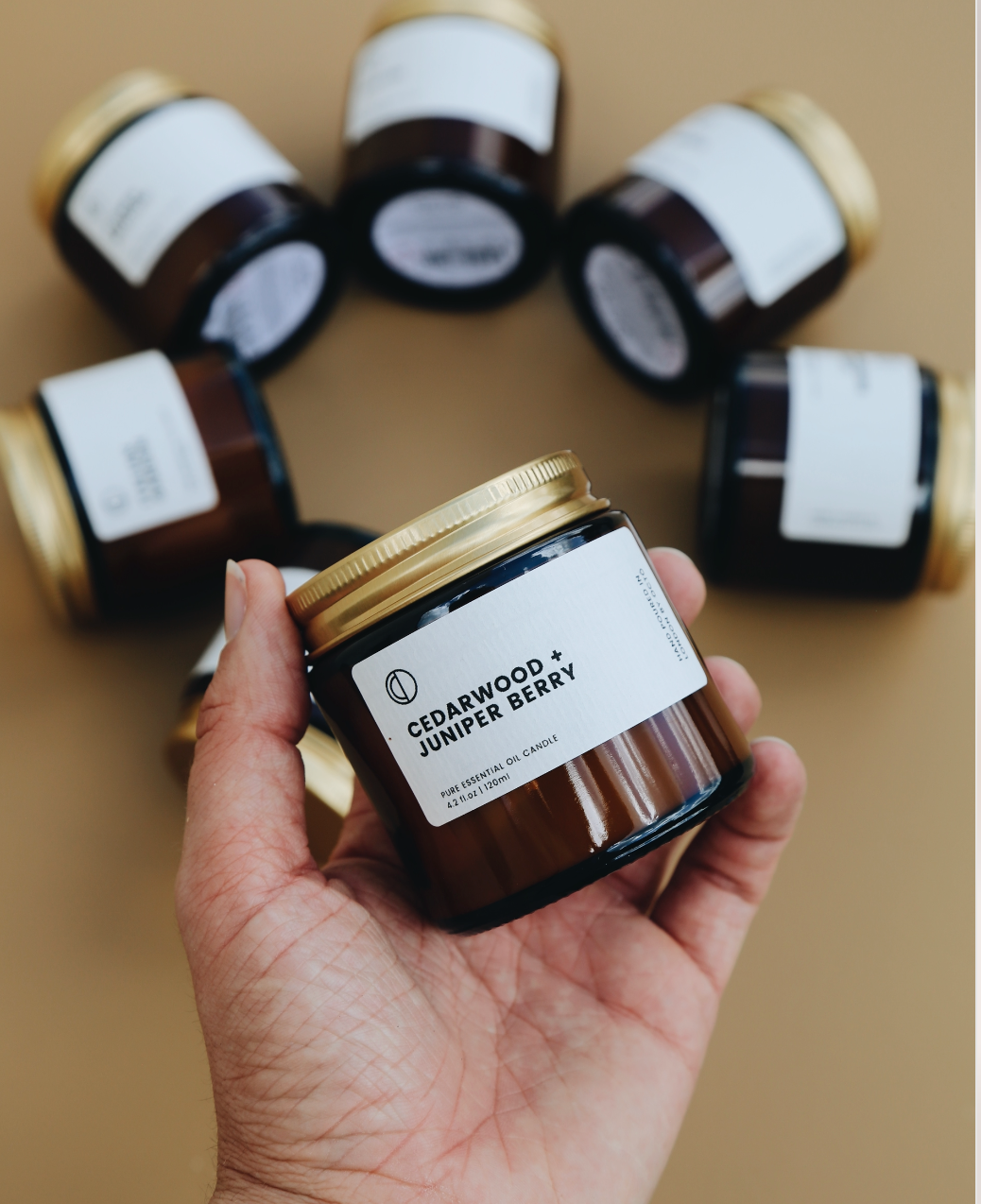 Cedar and Juniper essential oil candle in amber glass jar by OCTŌ