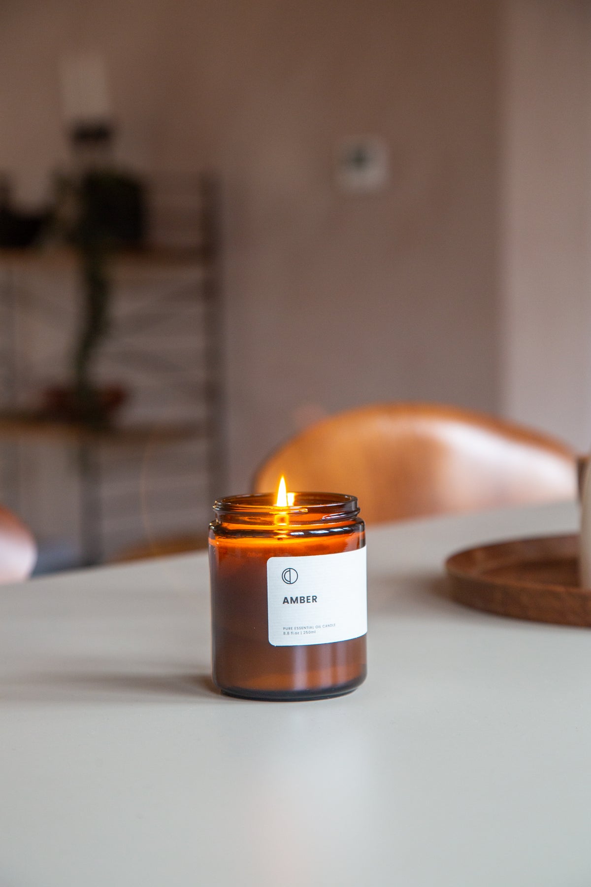 Amber essential oil candle in amber glass jar by OCTŌ