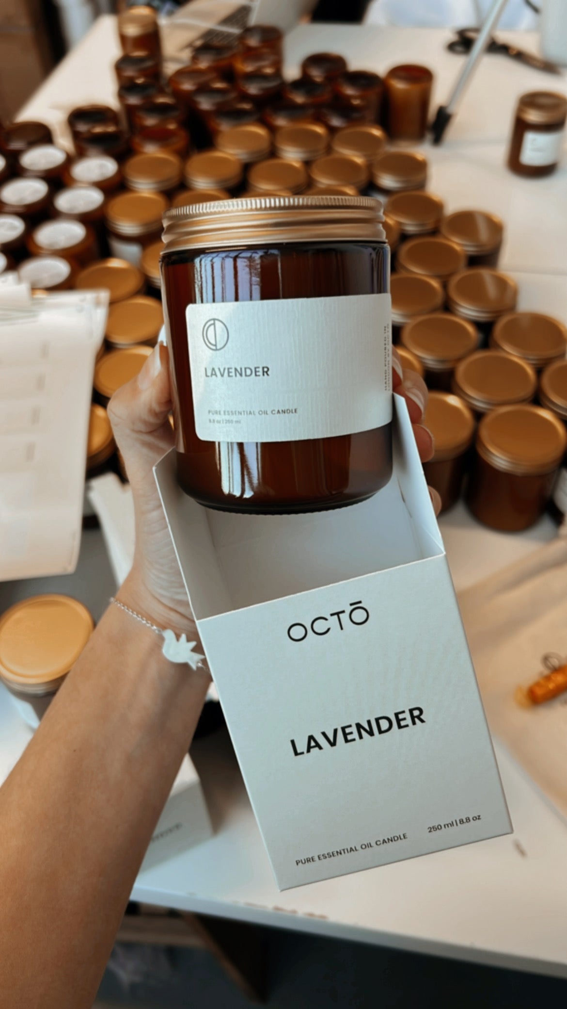 Lavender essential oil candle in amber glass jar by OCTŌ