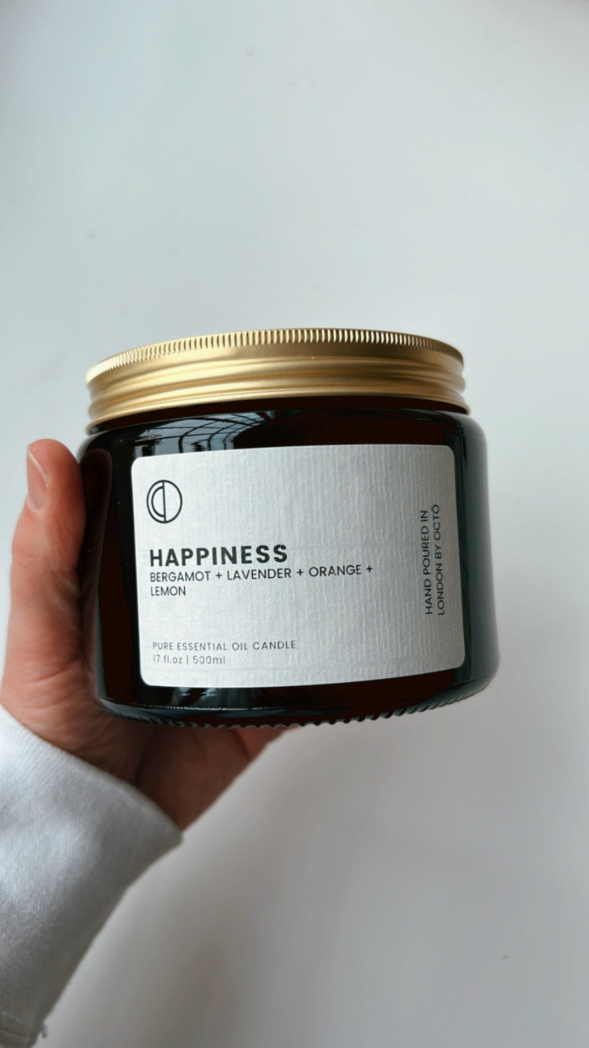 One-off blend essential oil candle in amber glass jar by OCTŌ