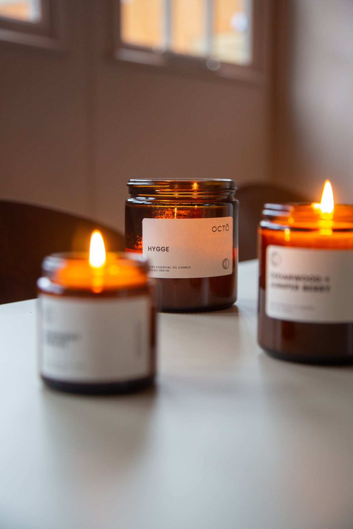 Sweater Weather essential oil candle in amber glass jar by OCTŌ