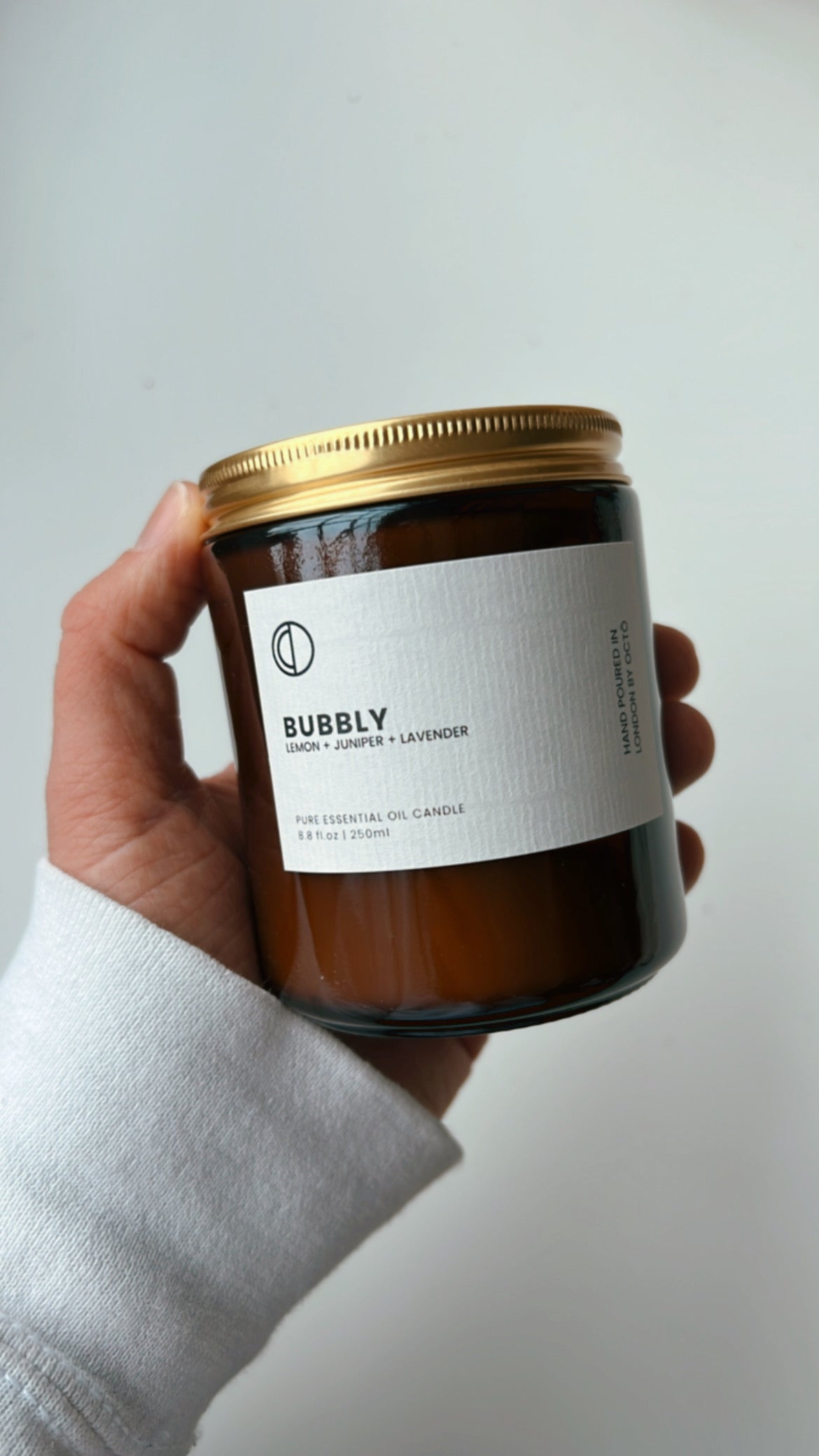 One-off blend essential oil candle in amber glass jar by OCTŌ