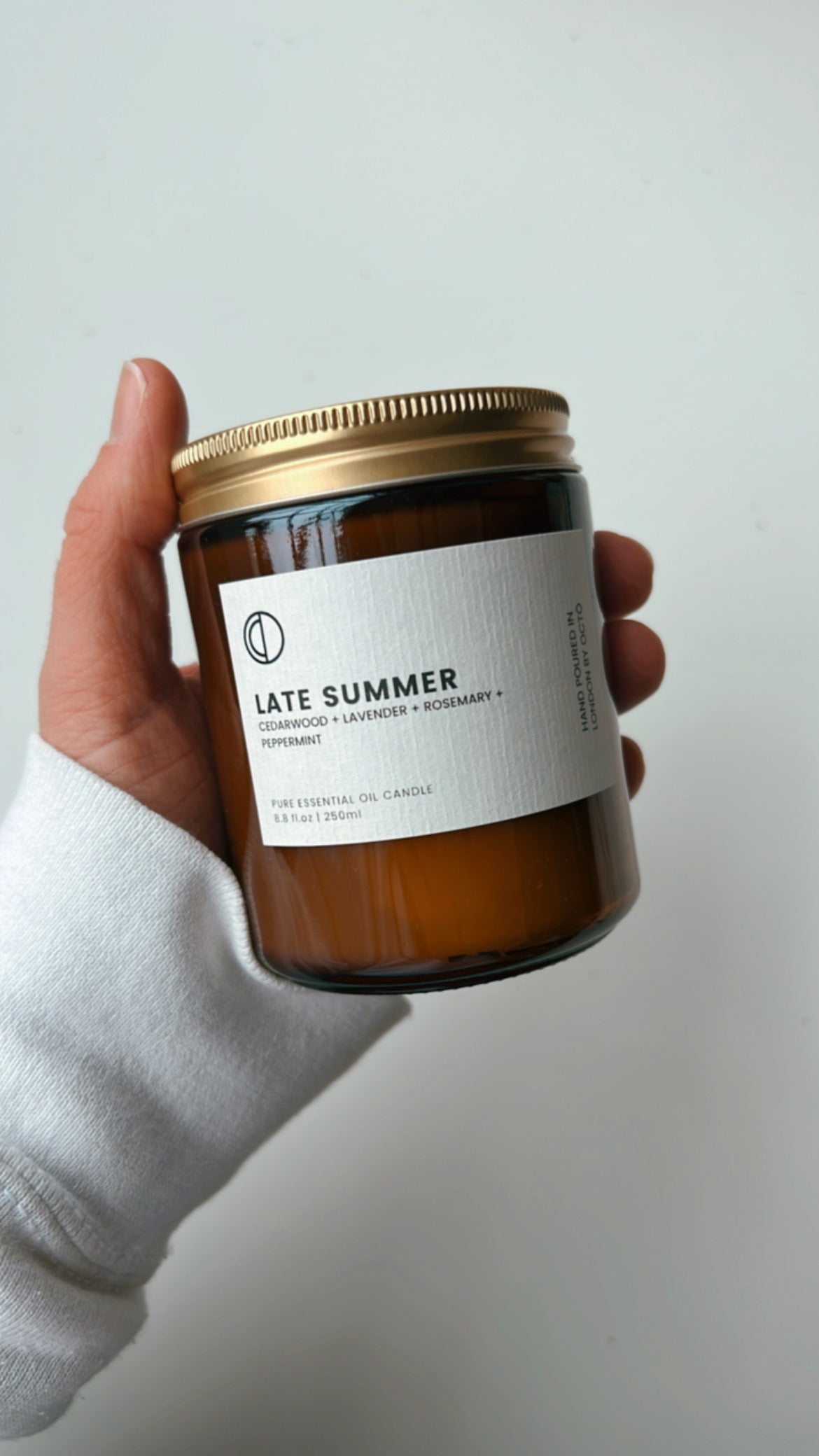 One-off blend essential oil candle in amber glass jar by OCTŌ