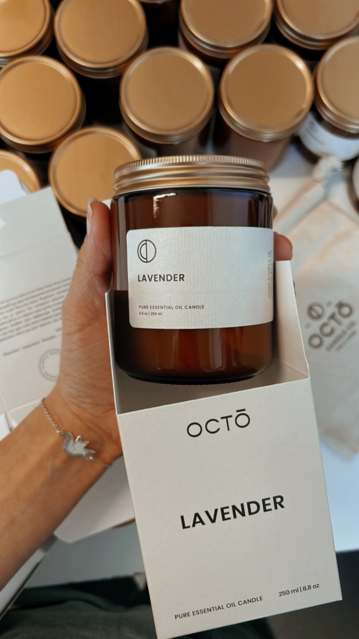 Lavender essential oil candle in amber glass jar by OCTŌ