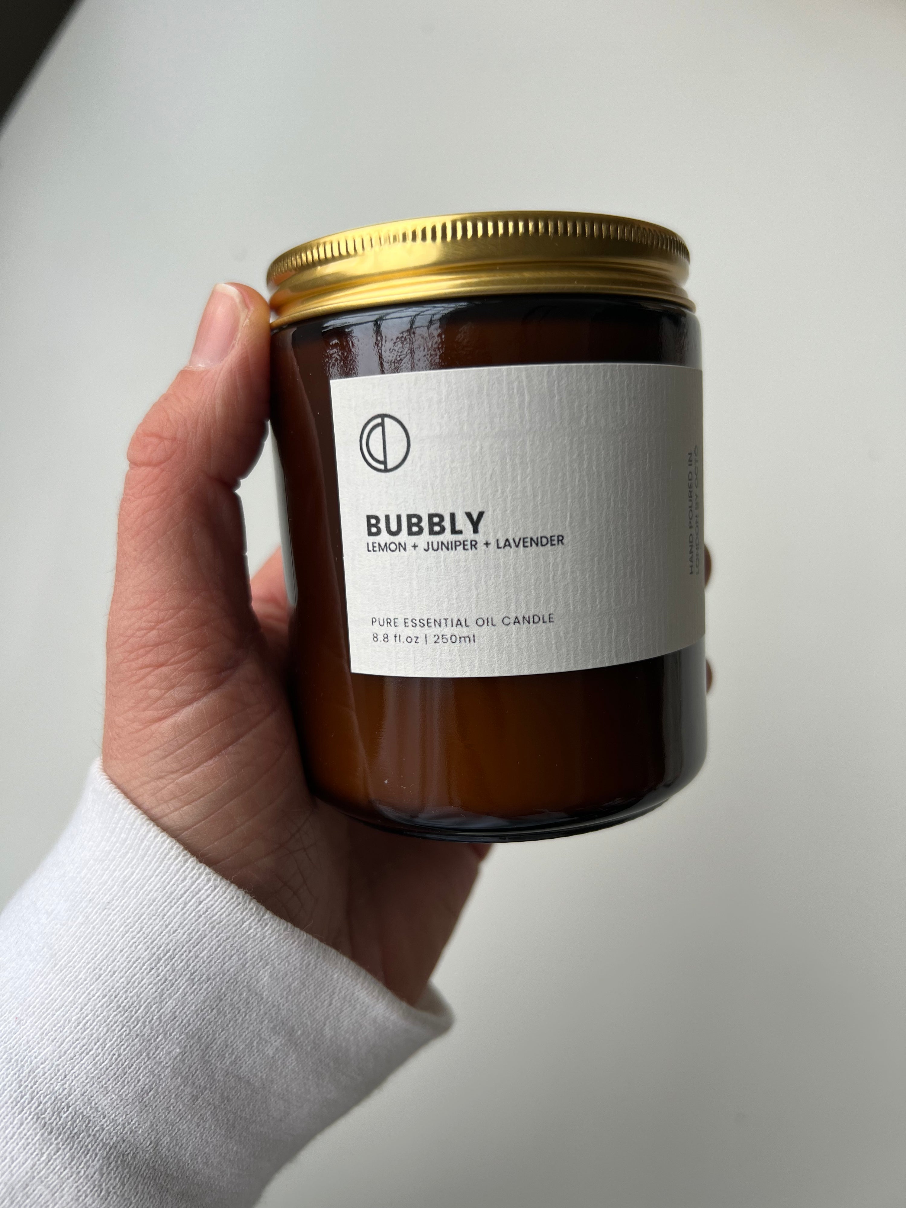 One-off blend essential oil candle in amber glass jar by OCTŌ