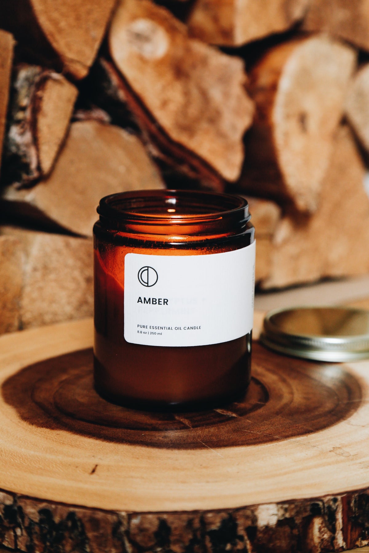 Amber essential oil candle in amber glass jar by OCTŌ