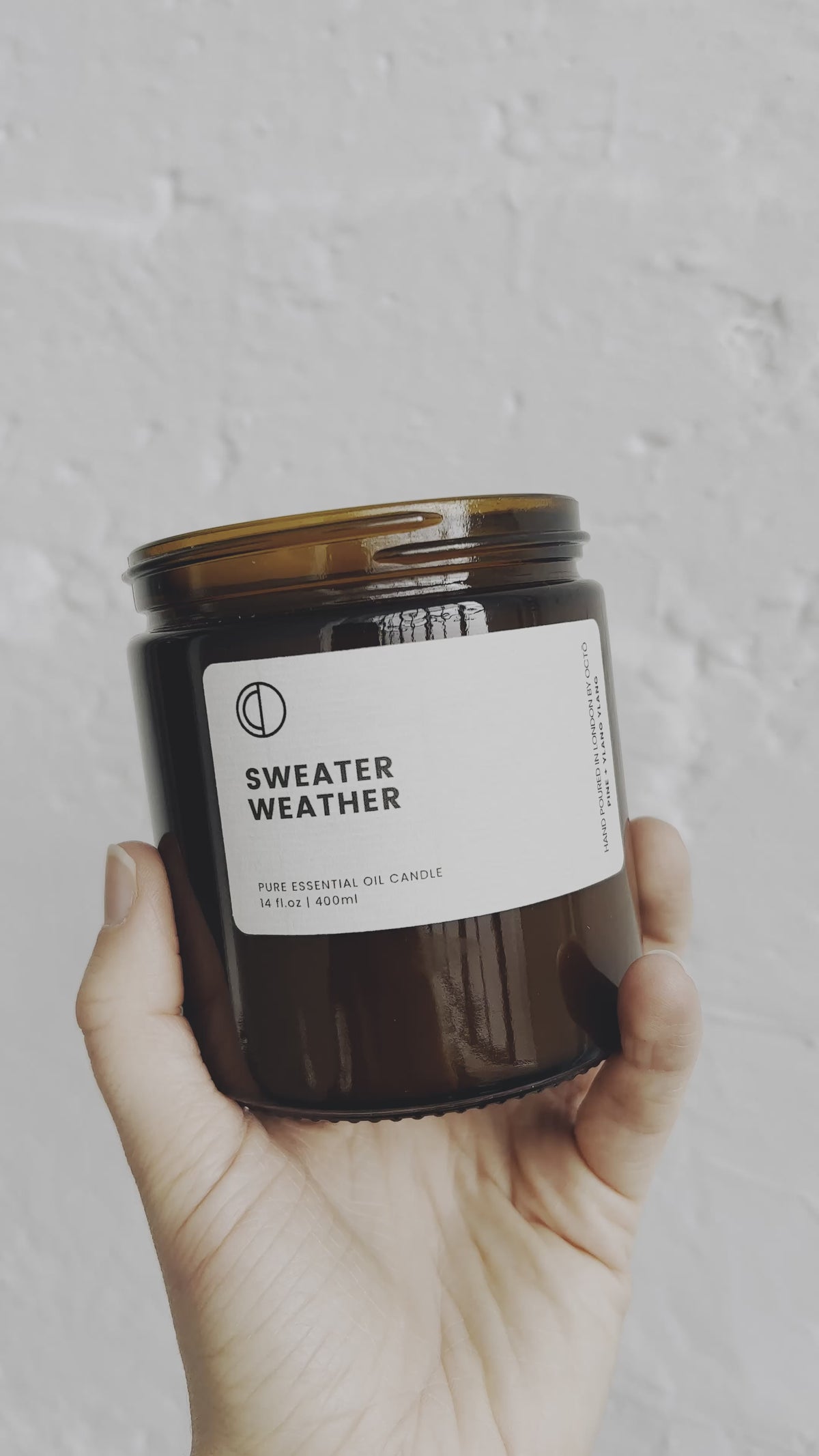 Sweater Weather essential oil candle in amber glass jar by OCTŌ