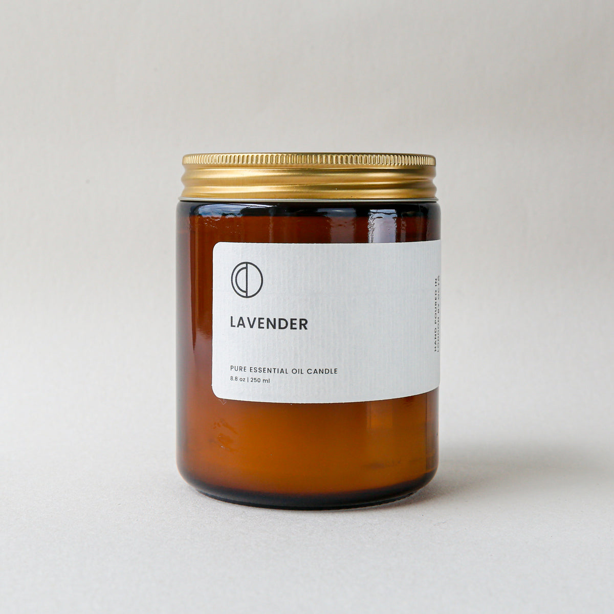 Lavender essential oil candle in amber glass jar by OCTŌ